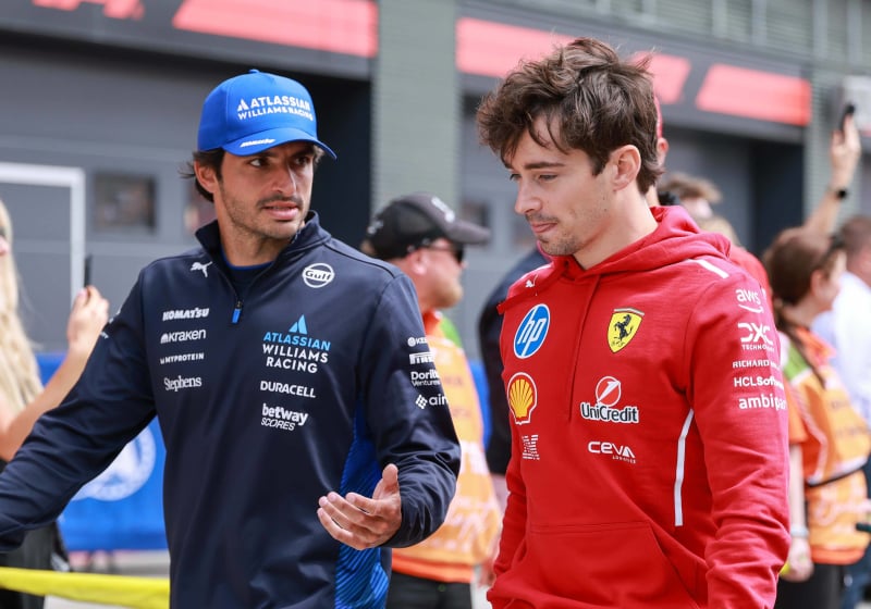 Sainz and Leclerc in the paddock