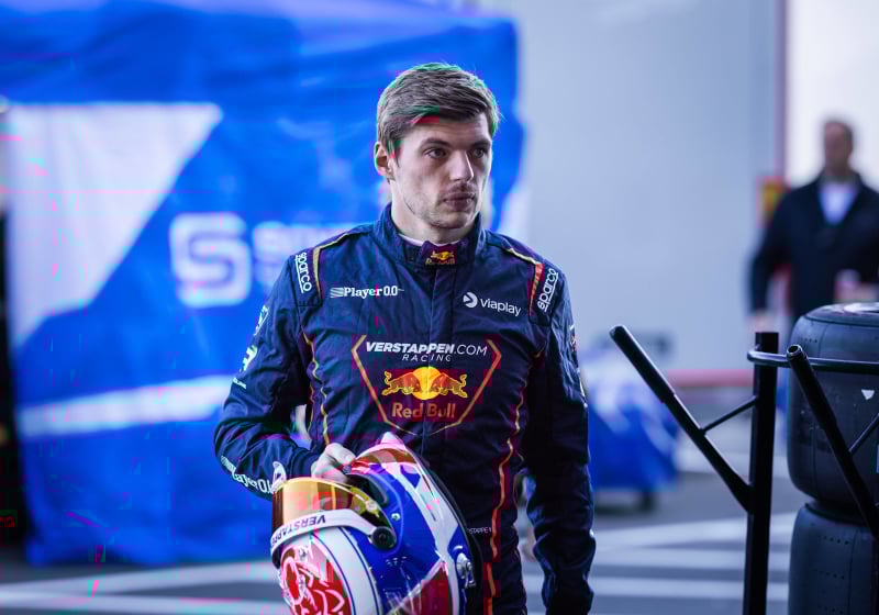Verstappen in Verstappen dot com Racing suit