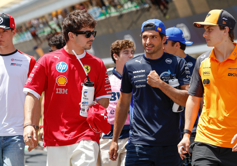 Bearman, Leclerc, Sainz and Piastri walking through the Spanish GP paddock