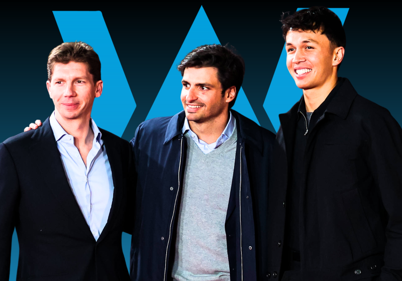 Vowles, Sainz and Albon posing for a group picture with an edited Williams logo background