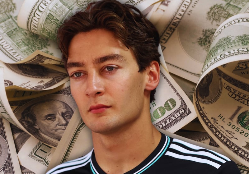 George Russell with a background of 100 dollar bills