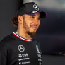 Hamilton all smiles as Mercedes show off NEW car